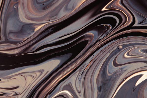 Mesmerizing abstract swirl design with fluid acrylic paint and smooth curves.